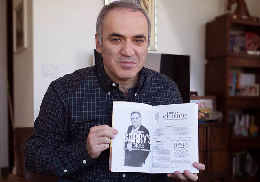 Garry Kasparov with Chess Informant 116