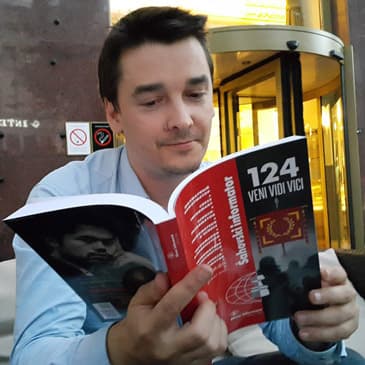 Alexander Morozevich with Chess Informant 124