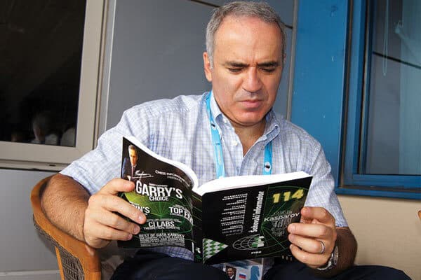 Garry Kasparov reading Chess Informant 114, open to his 'Garry's Choice' column. Photo by Josip Asik.